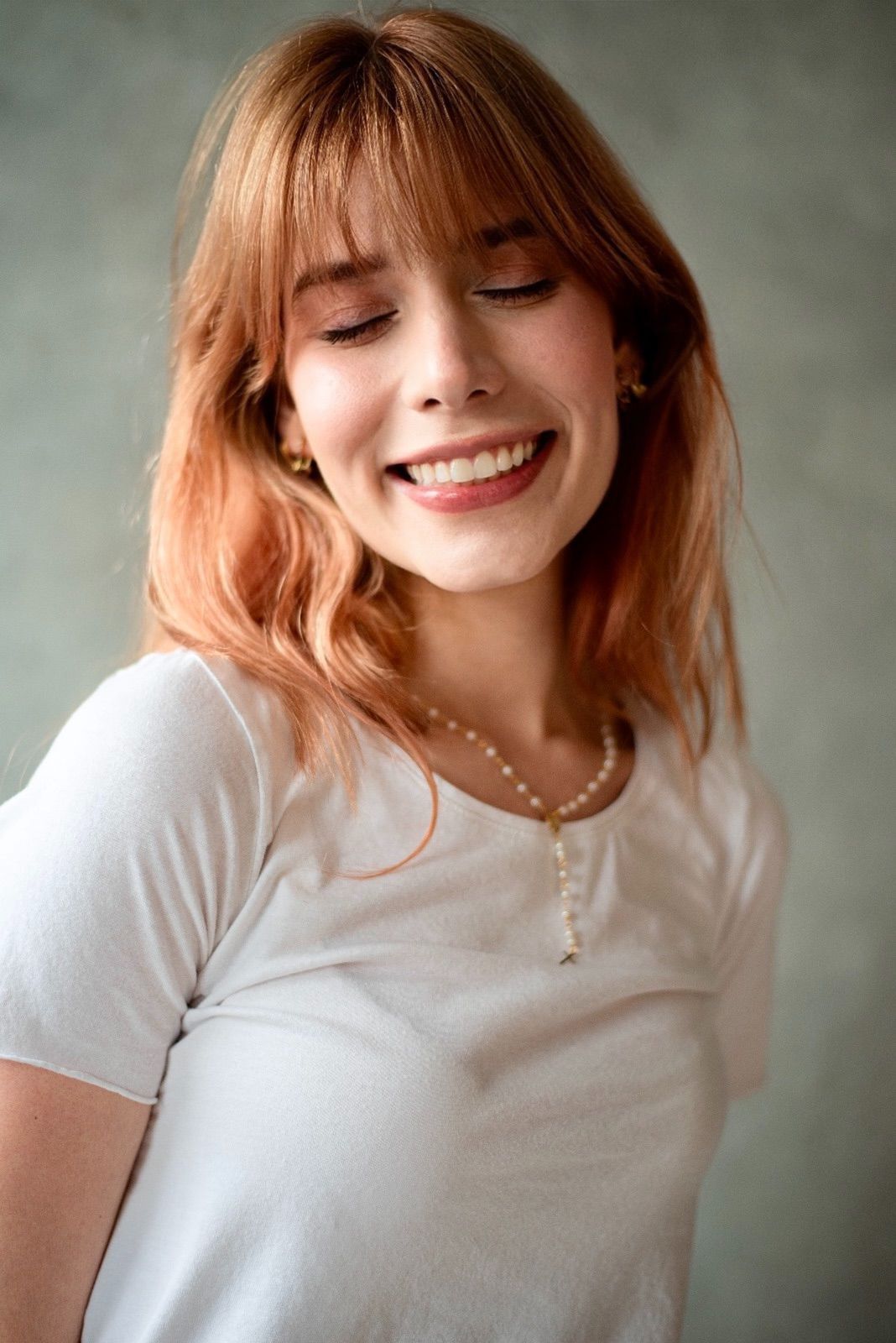 Headshot sonriendo
